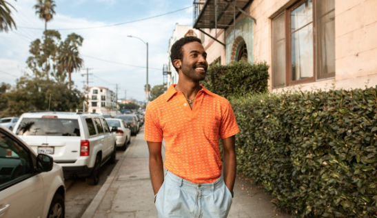 man smiling on the street